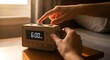 © Nature - A close-up of an alarm clock showing 6:00 AM, with a hand hitting the snooze button and another determined hand turning it off, morning light streaming through a window.