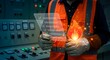 © Batoor - Worker inspecting safety checklist with digital fire hazard display in industrial power plant control room.