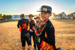 © unai - Young baseball player smiling holding glove on field