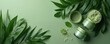 © Viktor - Green beauty products like creams, masks arranged with fresh green leaves on solid green backdrop. Powdered cosmetic ingredients scattered around jars. Minimalist natural arrangement for skincare.