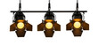 © Alexander - Three matte-black professional led studio par cans with barn doors, suspended, casting dramatic warm golden light on a transparent background. Concept for professional lighting advertisement