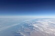 © elbanco - A breathtaking aerial view showcasing the vast blue sky and clouds, illustrating the beauty of our planet from above.