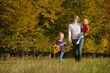 © Westend61 - Mother and daughters walking through autumn meadow in Bavaria outdoors
