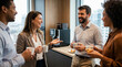 © Marko - Business team in office having discussion during coffee break