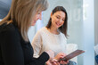 © Gonzalo Infiesta - Esthetician consulting client discussing skincare treatment