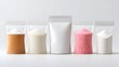 © pkproject - An assortment of five resealable pouches each filled with a different granular substance like sugar or salt showcasing a variety of colors and textures in a studio setting