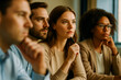 © thodonal - Focused group of professionals engaged in thoughtful discussion or meeting