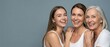 © Fernando - Three women of different ages smiling and laughing together Multigenerational female friendship and family bond Concept of joy, happiness, and connection