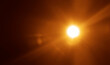 © Maxim Chuev - shiny sun rays burst, sunbeams, sunrays, sunshine sunburst design. Yellow warm light effect, sunny beams, yellow orange red golden sunshine isolated on black background. star dust sun light shine