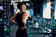 © Prostock-studio - Portrait Of Young Arab Bodybuilder Suffering Lower Back Pain At Gym, Upset Middle Eastern Male Athlete Rubbing Painful Sore Zone After Getting Sport Injury, Having Lumbar Spine Ache, Copy Space
