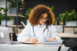 © Serhii - Medical student studying, writing notes, and preparing for medical career