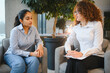 © Serhii - Indian woman receiving therapy from female psychologist