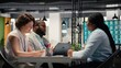 © DC Studio - Diverse hiring team and black candidate discuss about qualifications for a job opening within the business organization. Evaluating CV resume information, head hunting concept.