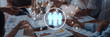 © InfiniteFlow - Team members engage in a collaborative meeting with digital tools. The image showcases hands working together, highlighting teamwork and communication in a business environment. Trope