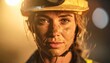 © Mahmudi - Portrait of a dirty female construction worker wearing a hard hat.