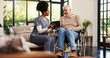 © peopleimages.com - Tablet, help and wheelchair with old man and nurse for healthcare report, support or recovery plan. Online medical review, consulting or rehabilitation with senior person with a disability in home