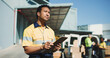 © BuyOutFelix06/peopleimages.com - Logistics, clipboard and thinking with delivery man outdoor for supply chain, checklist and idea. Distribution manager, transport coordinator and quality assurance vision with person and reflection