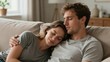 © olga_demina - Caucasian Couple Resting On Couch, Photographer Partners Sharing Quiet Cuddle After Shoot, Relaxed Poses, Soft Daylight, Casual Tees, Close Embrace Conveys Contentment And Slow Weekend