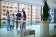© .shock - Team of healthcare professionals discussing patient care in a modern hospital setting during the daytime