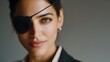 © Maryna - A woman with a black eye patch on her left eye