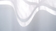 © Chengraphy - White fabric background with big wavy line, shadow and soft sunlight. Front view of white curtain during warming day. Cozy, wave, minimal, lifestyle concept for wallpaper, textiles, texture. Wavy fabr