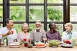 © Rawpixel.com - Group of diverse seniors enjoying a meal together, laughing and sharing drinks. Elderly friends, diverse gathering, joyful meal, happy seniors. Group of happy senior people enjoying the meal.