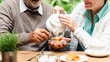 © Rawpixel.com - Senior couple enjoy afternoon tea outdoors, pouring tea. Senior couple man and woman relax in garden with tea and snack. Relaxed senior couple drink tea with snack in garden, afternoon relax