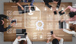 © InfiniteFlow - A diverse team collaborates in a modern workspace, reviewing important documents on laptops and tablets, ensuring effective communication and workflow efficiency. Gantry