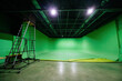 © Mulderphoto - Empty modern professional video production chroma key studio with green screen backdrop