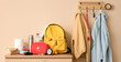© Pixel-Shot - Emergency backpack with necessities on chest of drawers in hallway