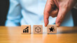 © Soyaeb - Strategic business approach prioritizing growth, product development, and customer experience. A hand places a star-rated block, emphasizing quality and customer satisfaction for market success