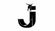 © Anisah - Skateboarder Silhouette performing trick on abstract J shape ramp