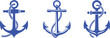 © ZULEKHA - Three blue nautical anchors with ropes on white background