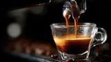 Close-up captures the rich, dark lungo shot cascading into a clear glass cup, its intense aroma and flavor promising a delightful coffee experience.