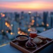 © zabhie - A solitary peaceful iftar moment on a balcony overlooking a city, with a simple meal, a glass of juice, and the fading daylight