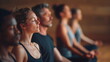 © Moiseieva  - group meditation in yoga studio, breath exercise, men and women meditating and breathing with closed eyes, breathwork concept