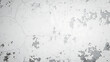 © Mahes - Distressed white concrete wall with cracked and peeling surface texture.
