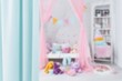 © Наталья Добровольска - Blurred background of daycare room representing child care services.