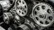 © Akash - Close-up of a car engine timing belt system with gears and pulleys