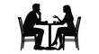 © Kuntol02 - A romantic dinner for two a man and woman seated at a table silhouette