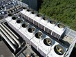 © eric1207cvb - Aerial view of rooftop cooling towers for AI data center and cloud computing facility.
