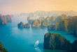 © Parilov - Majestic landscape of Halong bay at sunrise with limestone islands, travel landmark Vietnam