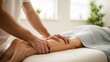 © Eve - Close up of professional hands performing deep tissue calf massage for muscle recovery and physical therapy, manual treatment for sports injury in a bright clinical wellness spa setting.