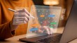 © lianlian liang - Business person using futuristic holographic calendar and task list interface for efficient time management and schedule planning while working on laptop, virtual reality concept.