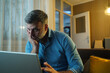 © Nenad - Man stressed while working on laptop