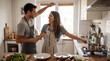 © ADMSalah - Happy young couple cooking together in kitchen. Playful husband and wife dancing laughing preparing healthy food. Romantic domestic lifestyle relationship love. Home cooking concept.