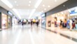 © Matthew - A bustling shopping mall interior with blurred figures and bright lights, creating a dynamic atmosphere