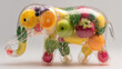 © Kristina - Balloon elephant made of clear latex, vibrant tropical fruits floating inside its body