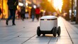 © 덕준 이 - delivery robot moving on city sidewalk at dusk,