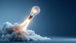 © sornram - A light bulb takes off like a rocket, symbolizing innovative ideas and creativity launching into the future amidst a cloud of smoke.